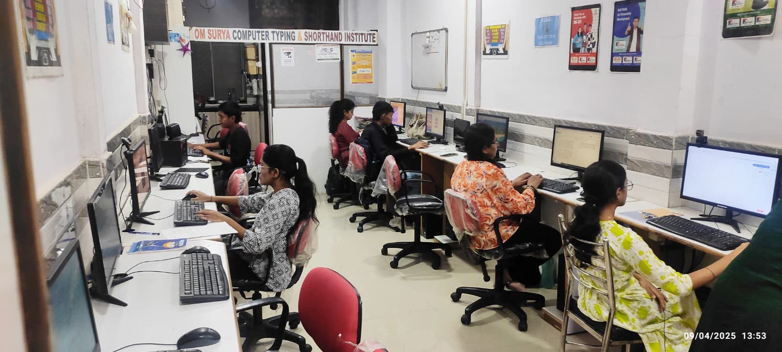 Students learning on computers inside the Suntech classroom